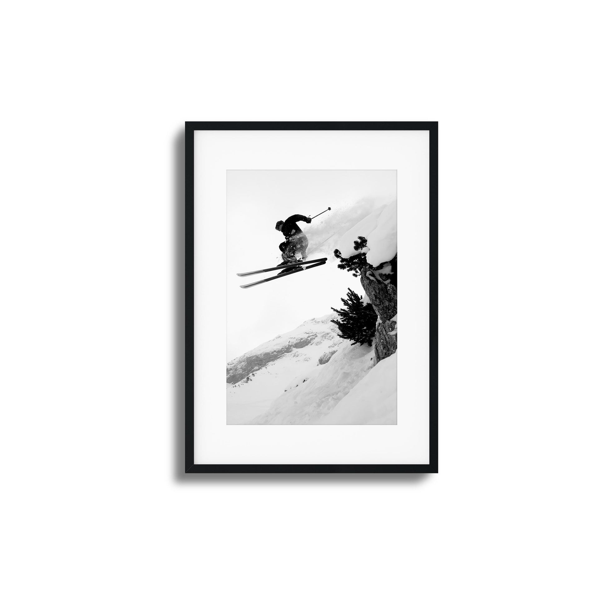 Skier mid-air jump on snowy mountain framed art