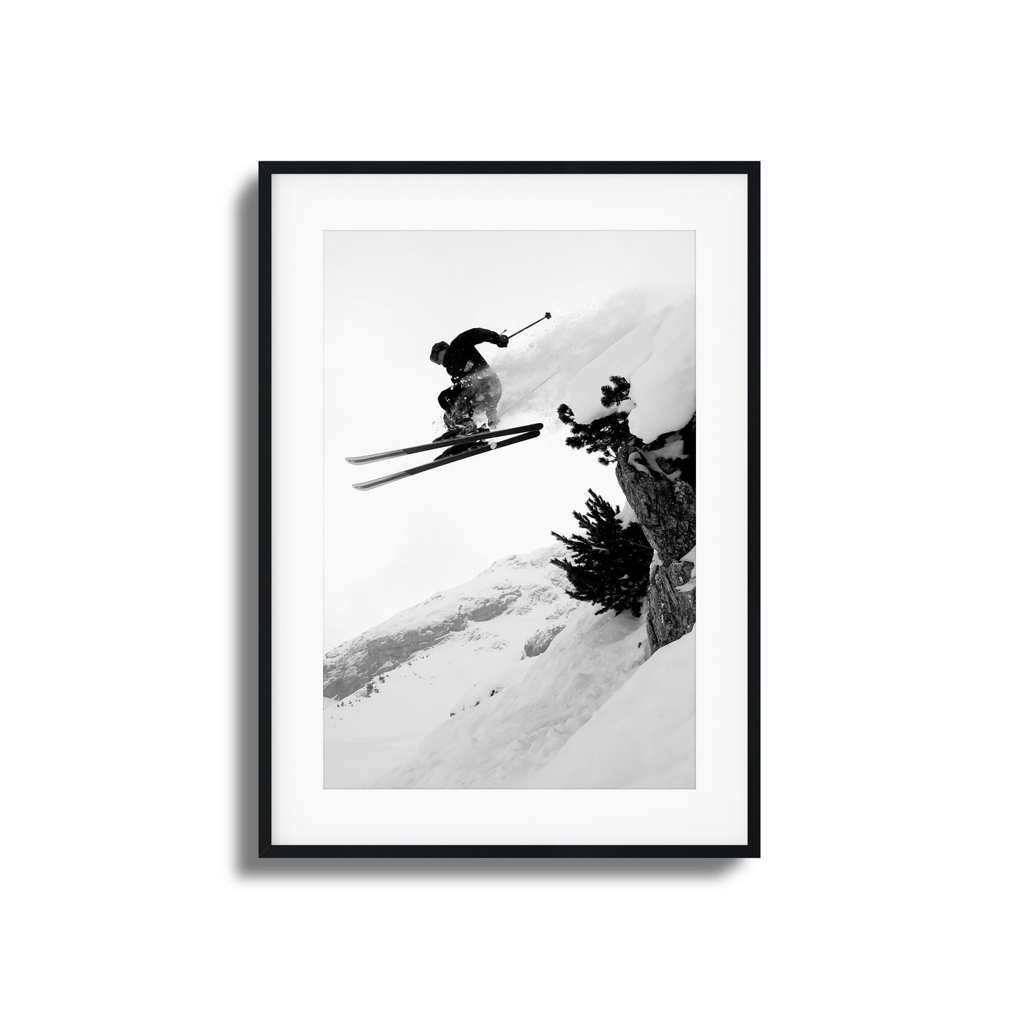 Skier mid-air jump on snowy mountain framed art