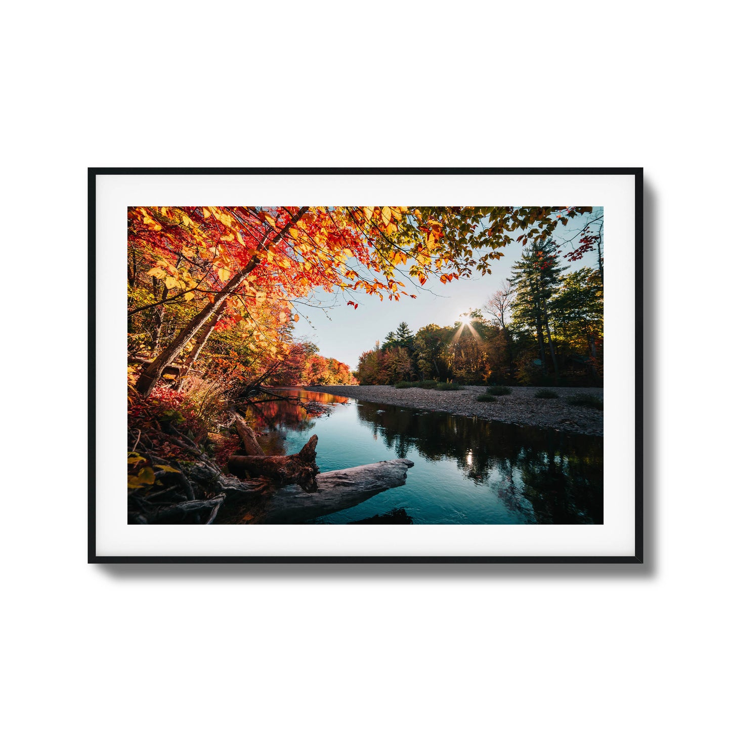 Autumn river with vibrant foliage and sunlight filtering through trees