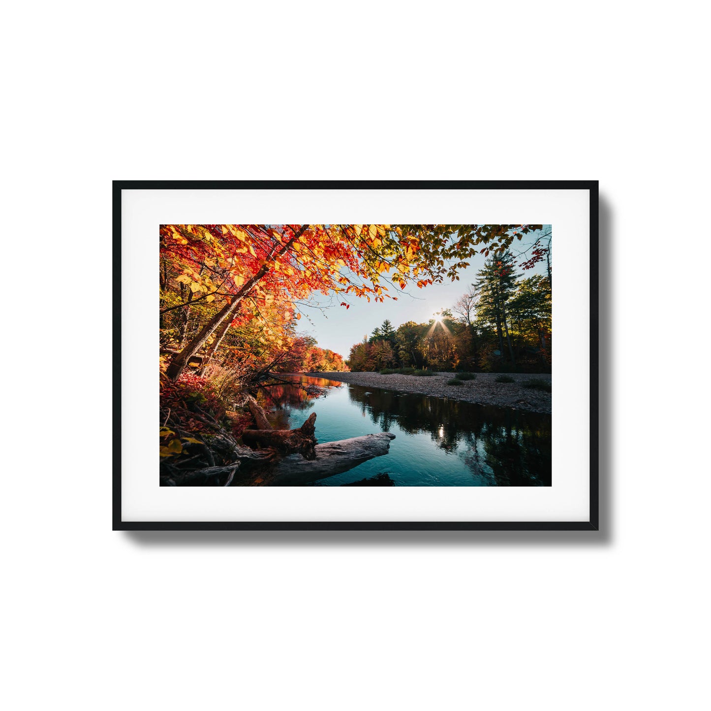 Autumn river with vibrant foliage and sunlight filtering through trees