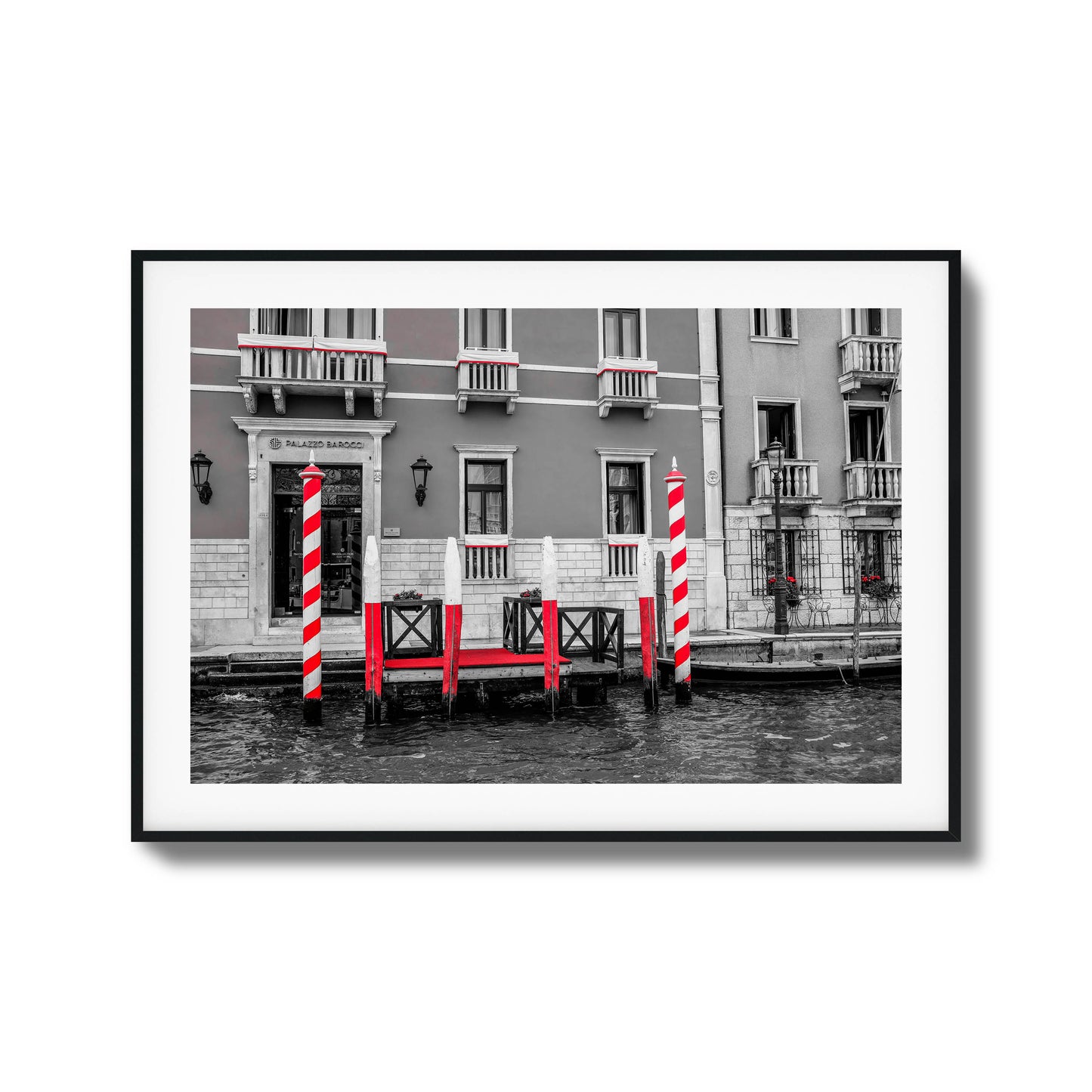 Venetian dock with striped poles and waterfront charm.