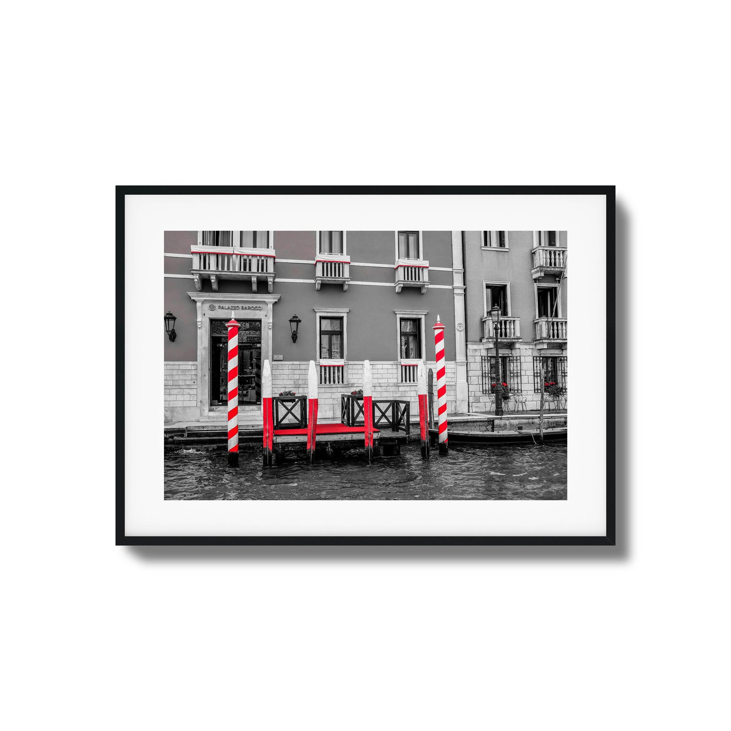 Venetian dock with striped poles and waterfront charm.