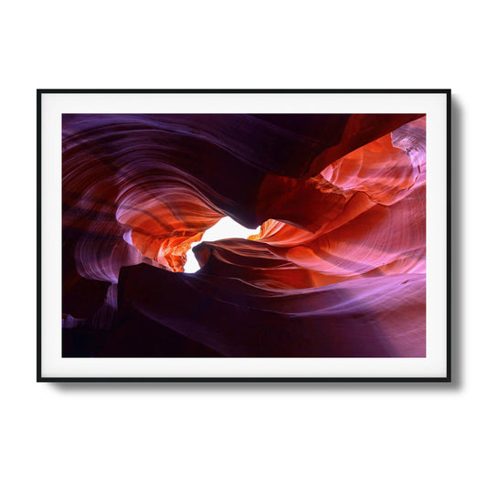 Vibrant red rock canyon with a bright blue sky