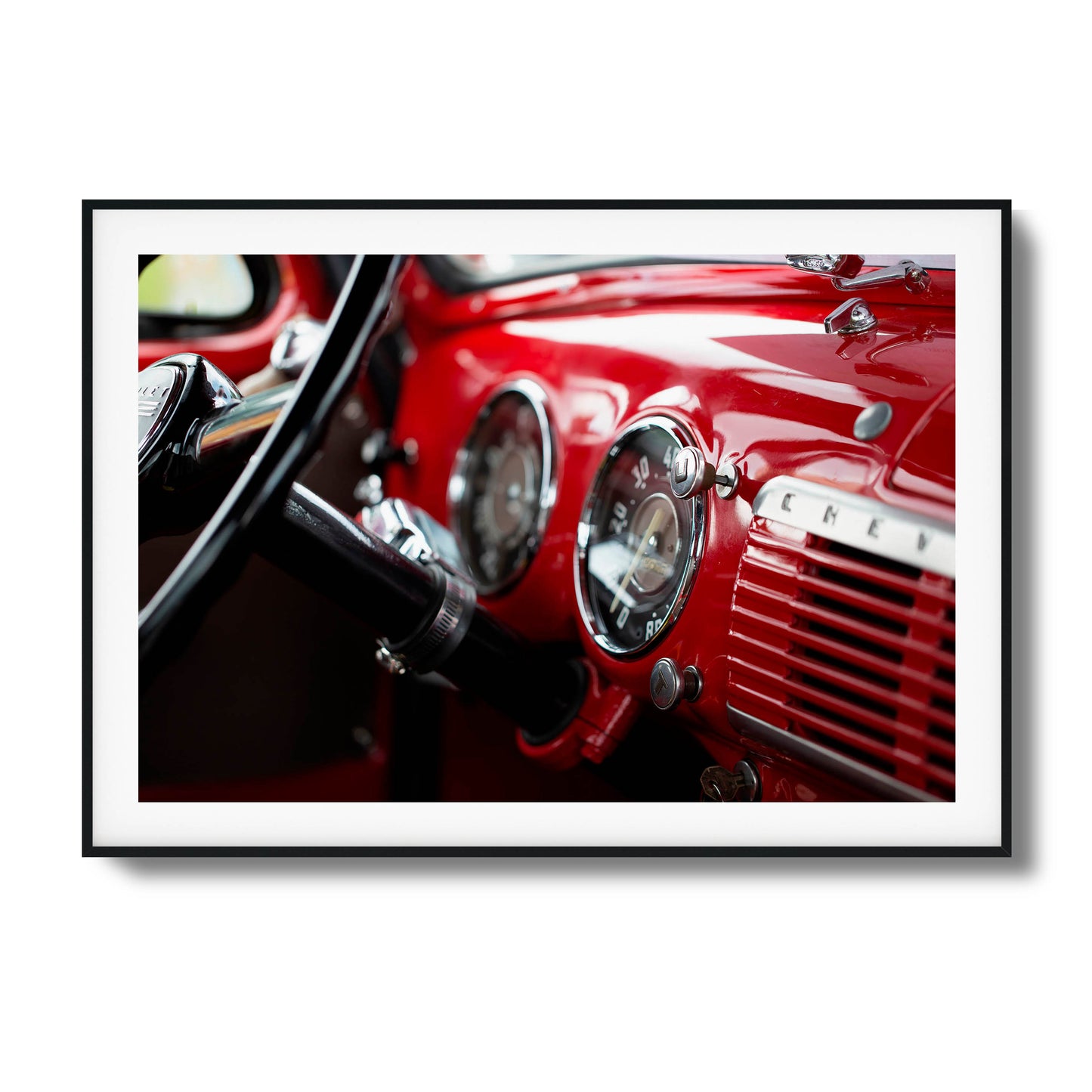 Red vintage car dashboard and steering wheel