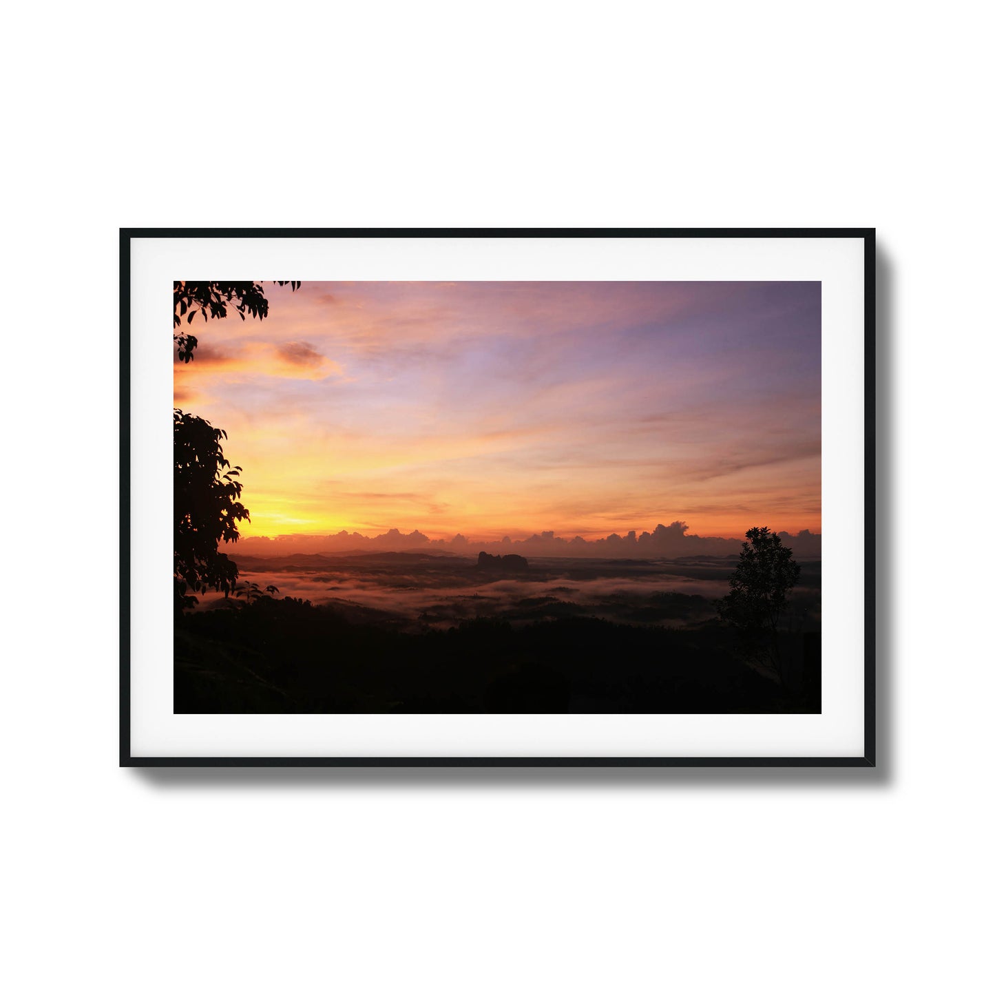 Cloud-covered valley illuminated by soft pastel hues of dawn, perfect for serene framed wall art.