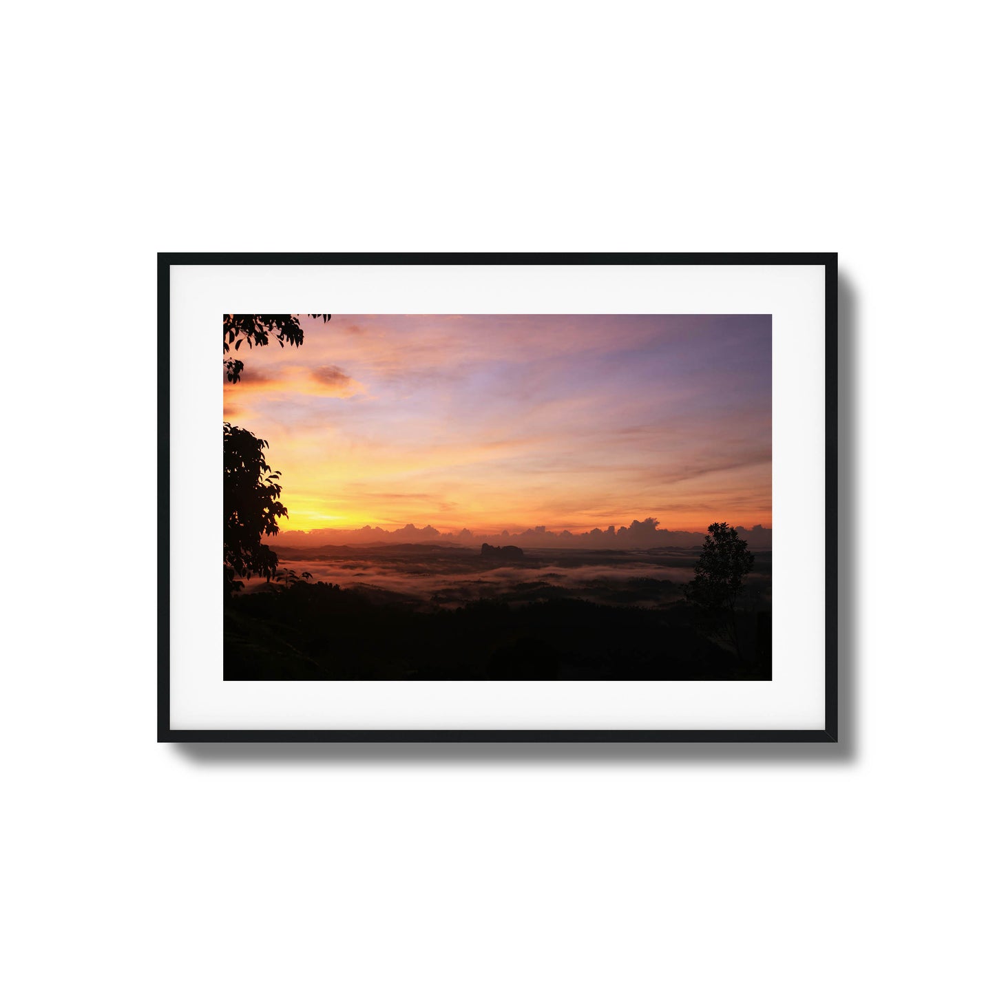 Cloud-covered valley illuminated by soft pastel hues of dawn, perfect for serene framed wall art.