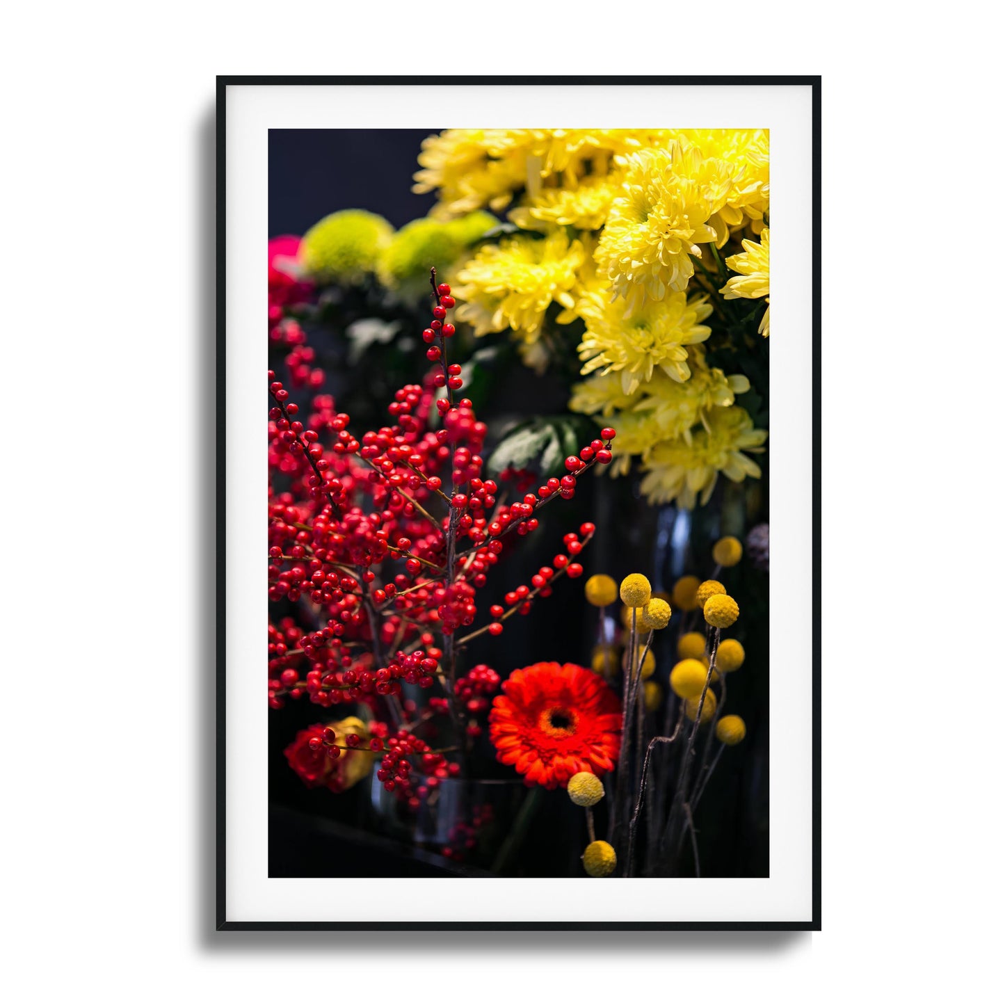 Yellow blooms with red berries