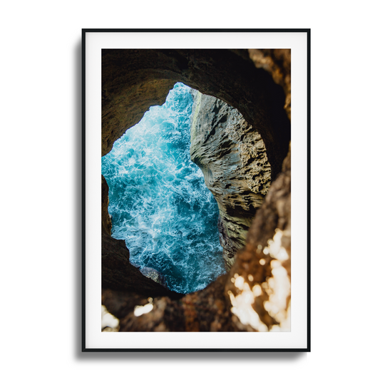 Cliff and ocean waves from above