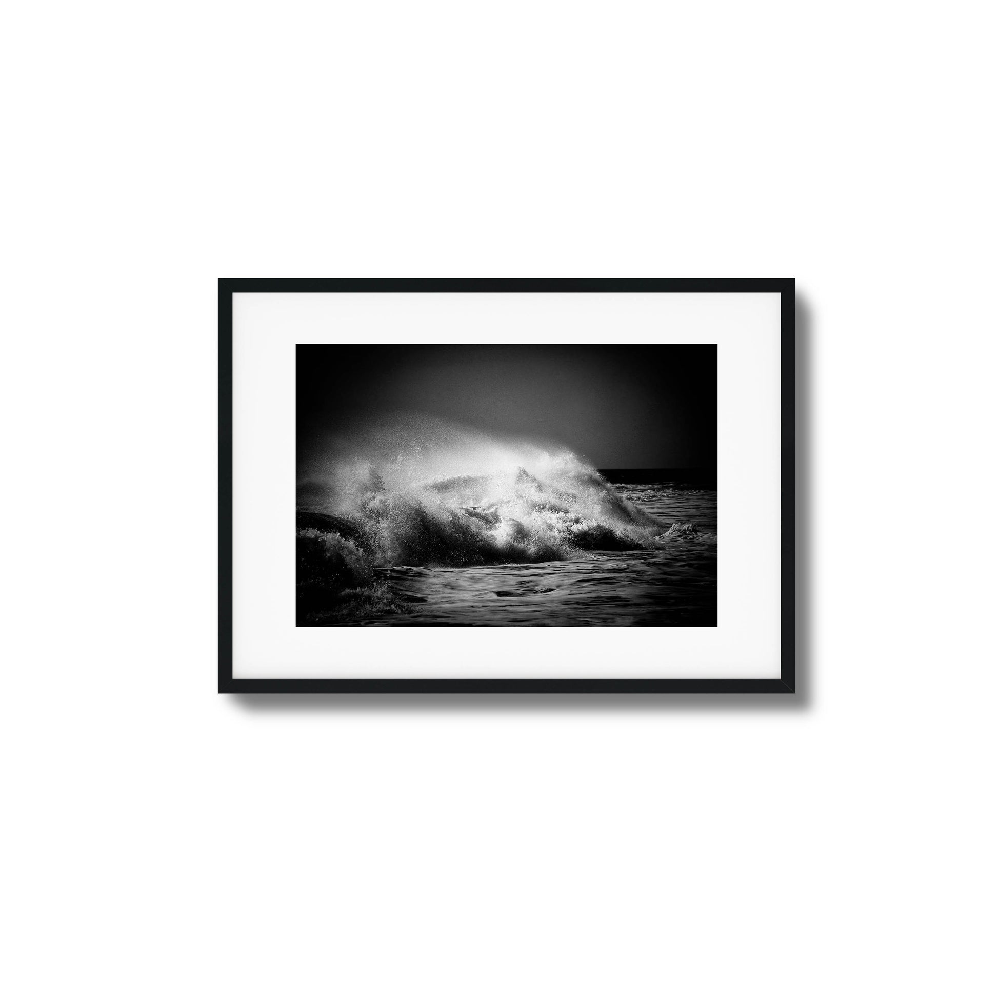 Black-and-white photo of crashing ocean waves, ideal for bold and dynamic framed wall art.