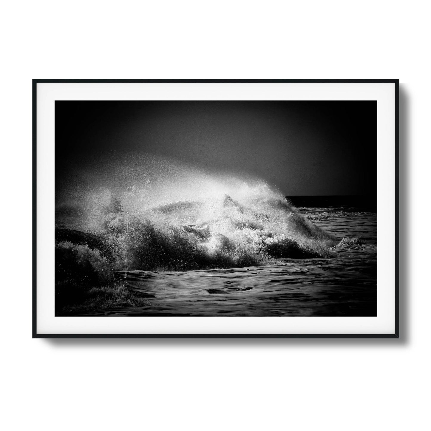 Black-and-white photo of crashing ocean waves, ideal for bold and dynamic framed wall art.