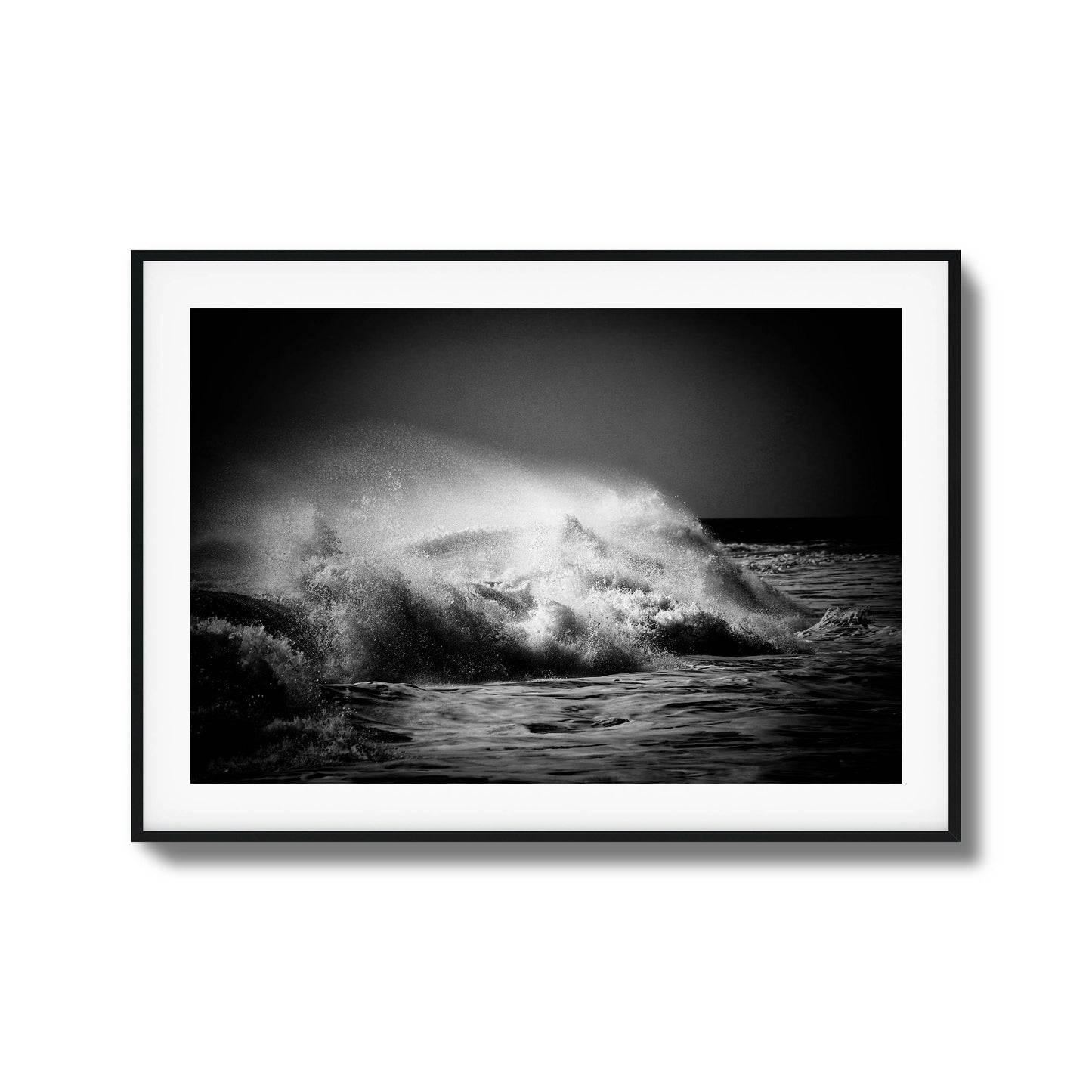 Black-and-white photo of crashing ocean waves, ideal for bold and dynamic framed wall art.