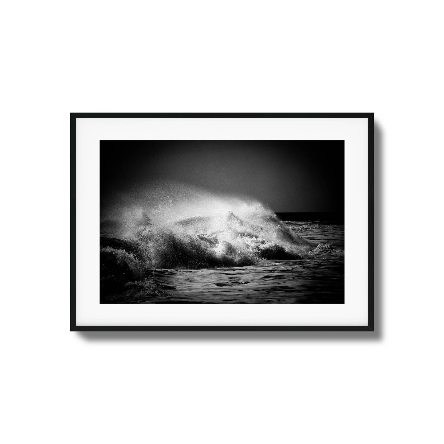 Black-and-white photo of crashing ocean waves, ideal for bold and dynamic framed wall art.