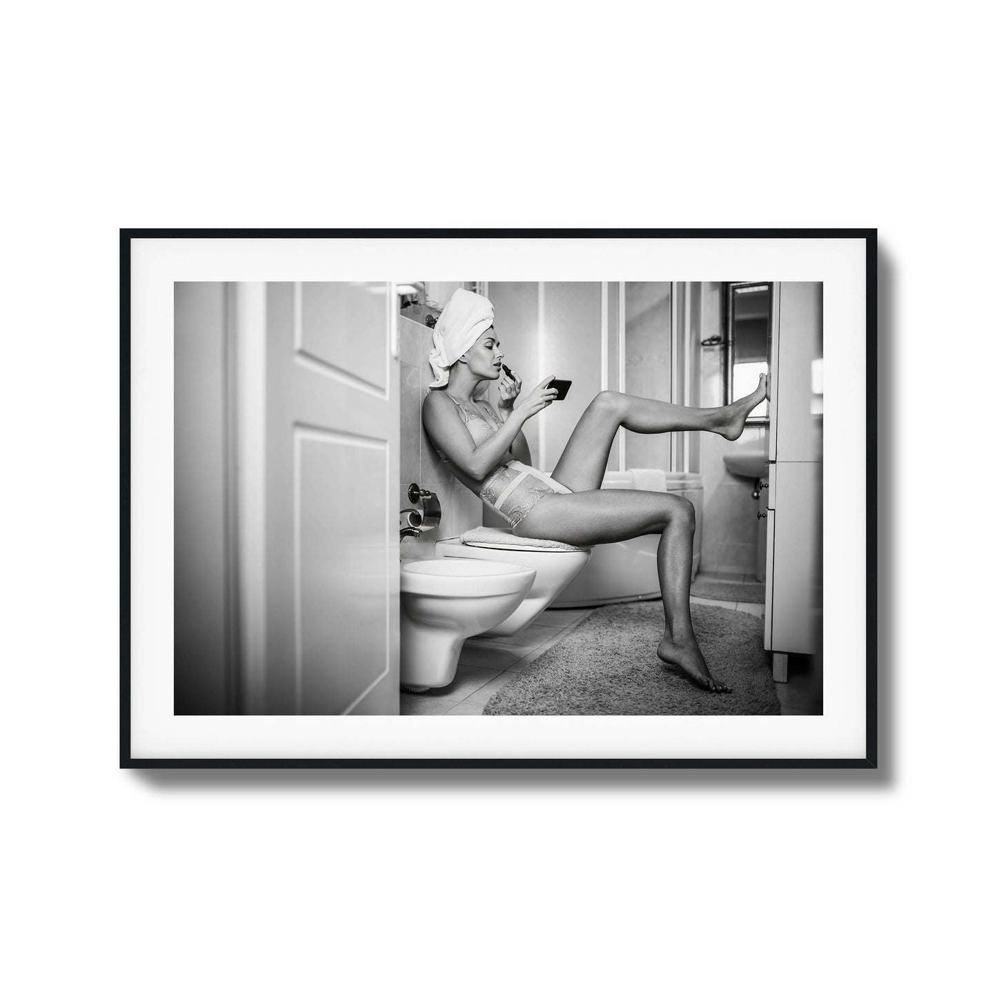 Black-and-white woman applying makeup in bathroom framed art