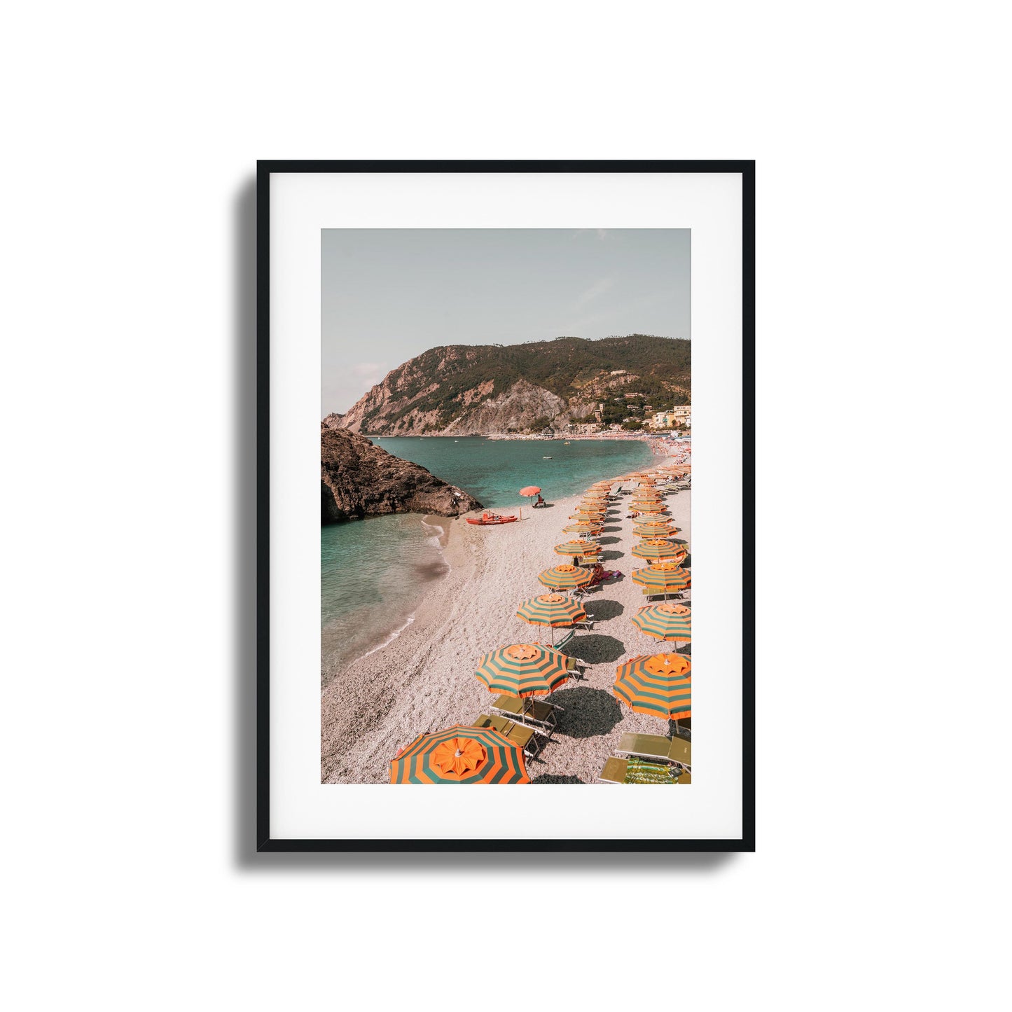 Vibrant Mediterranean beach with colorful umbrellas framed art