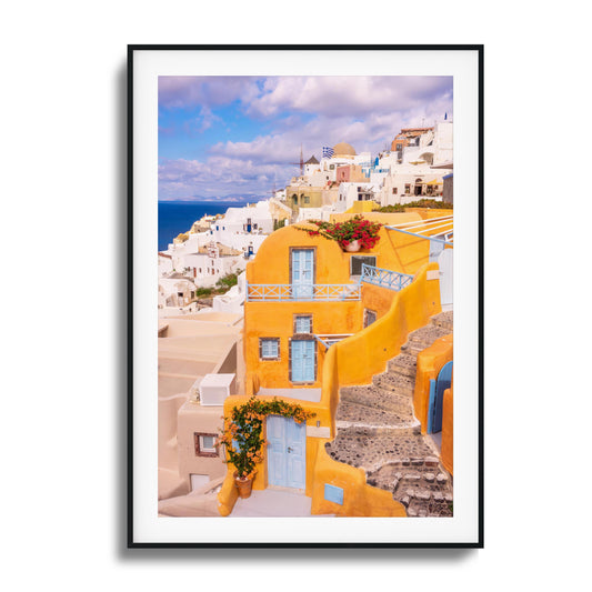 Yellow and white architecture of Santorini with ocean views, perfect for adding Mediterranean charm.