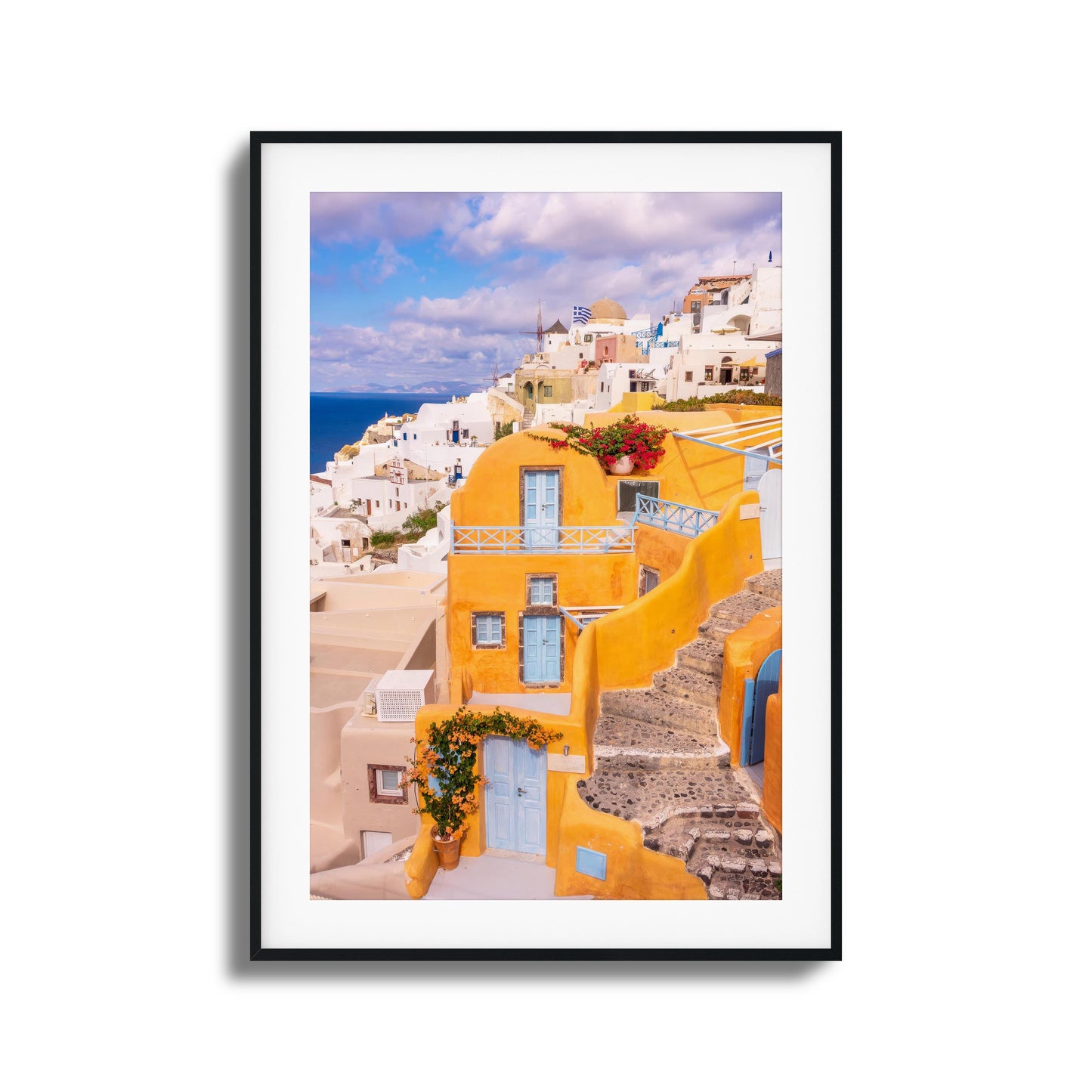 Yellow and white architecture of Santorini with ocean views, perfect for adding Mediterranean charm.