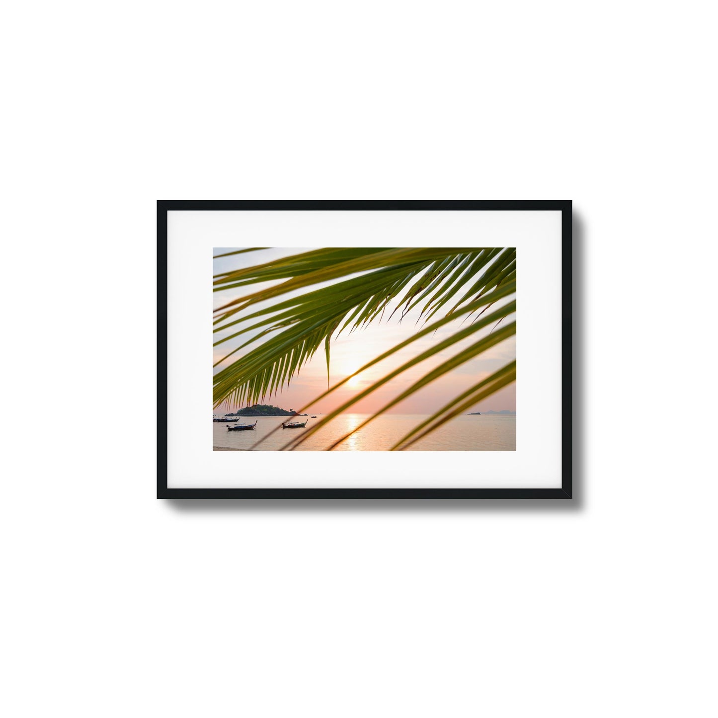 Sunset through Palm Leaves Framed Art