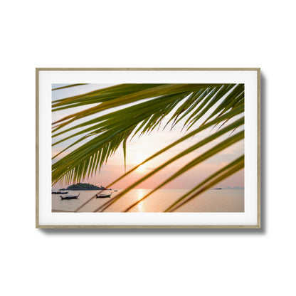 Sunset through Palm Leaves Framed Art