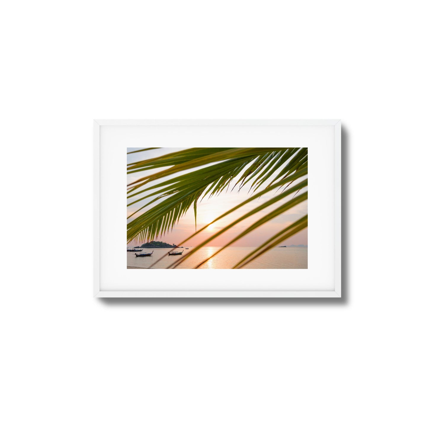 Sunset through Palm Leaves Framed Art