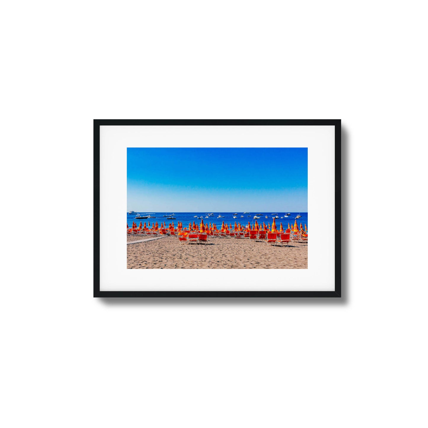 Colorful beach with orange umbrellas and blue ocean framed art