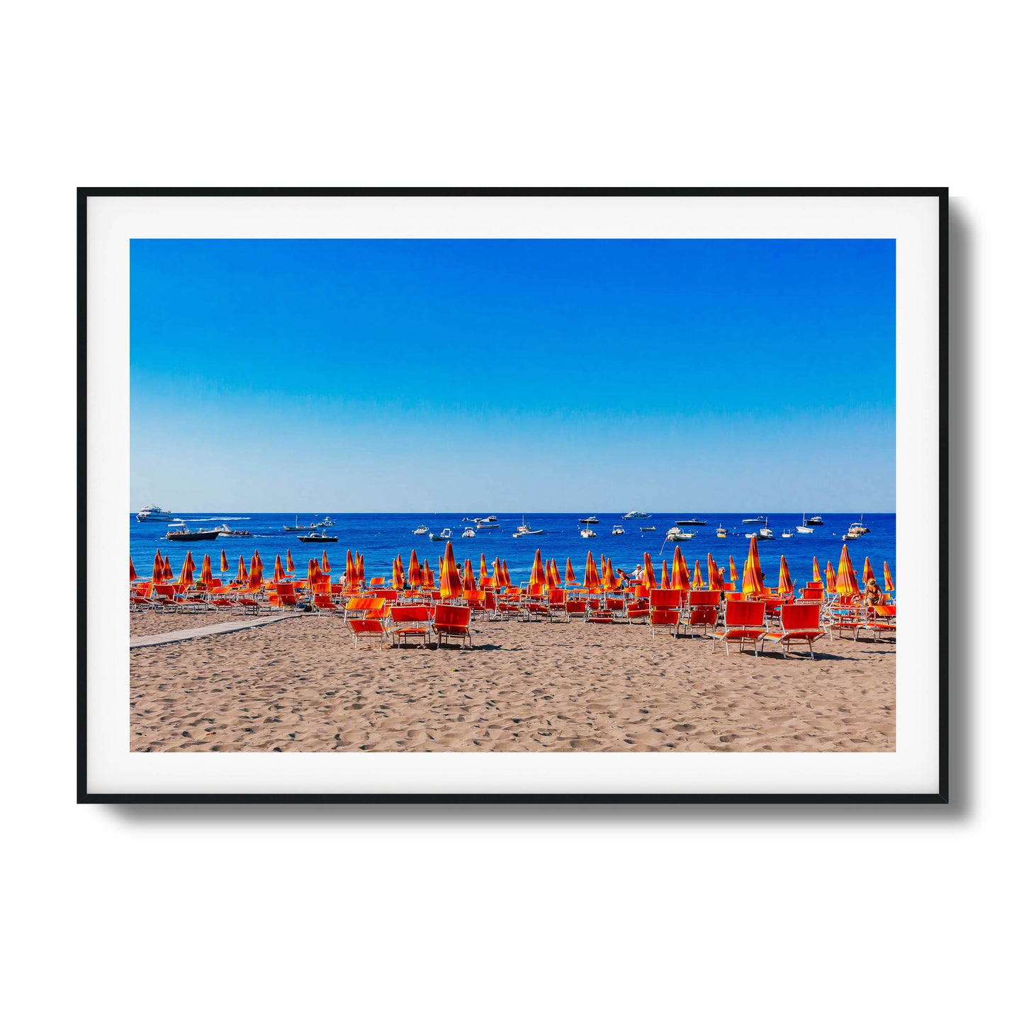 Colorful beach with orange umbrellas and blue ocean framed art