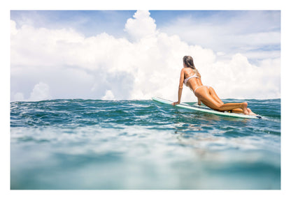 Woman Surfing on Blue Ocean Framed Art