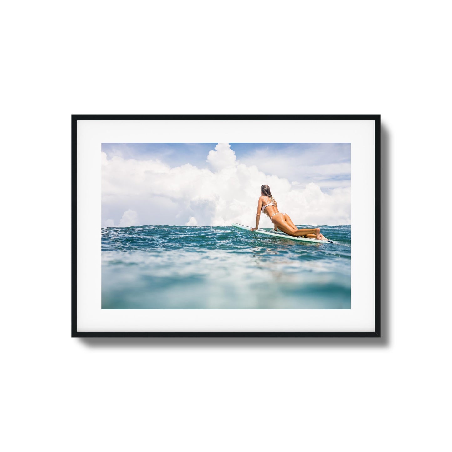 Woman Surfing on Blue Ocean Framed Art
