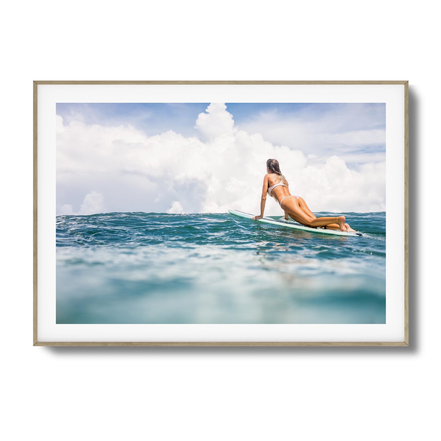 Woman Surfing on Blue Ocean Framed Art
