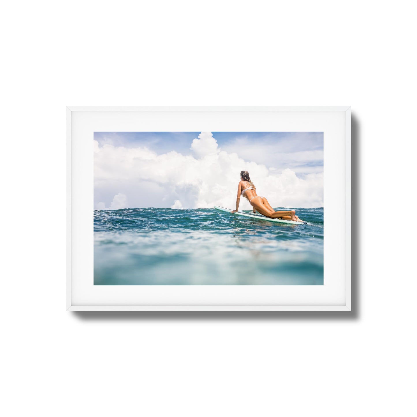 Woman Surfing on Blue Ocean Framed Art